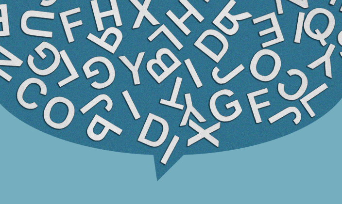 Image of random letters in a thought bubble to signify language