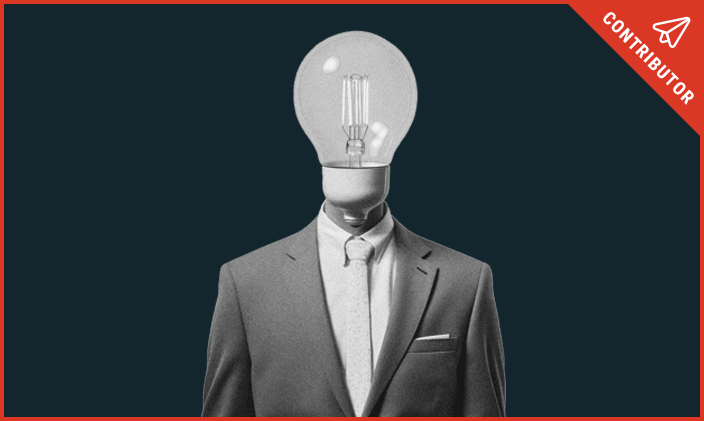 Body of a business man but a lightbulb for a head